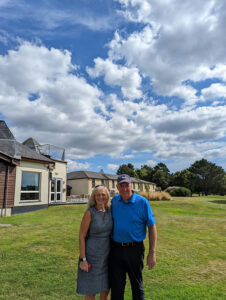 Clare and Graham bond on the golf course on a summer's day